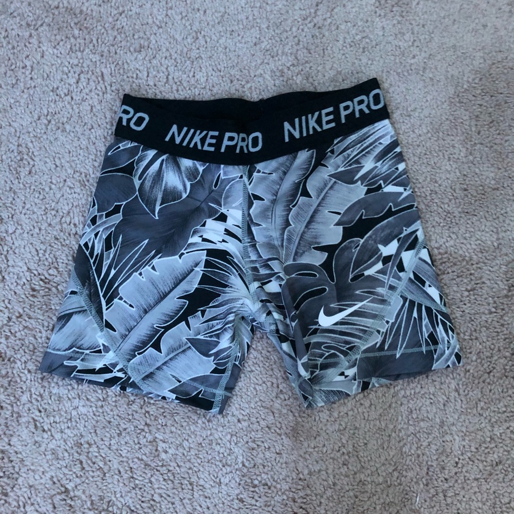 grey and black palm tree nike pros